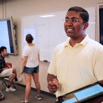 Professor Chirag Variawa teaches incoming first-year students in the Technology-Enhanced Active Learning (TEAL) room in the Sandford Fleming building. Variawa is an expert on identifying and eliminating barriers to learning for engineering students. (Credit: Marit Mitchell).