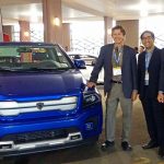 From left: UTEV’s Professor Peter Lehn, Dr. Theo Soong, and Professor Olivier Trescases (all ECE) at the Electric Mobility Canada Show with Havelaar’s electric pick-up truck, the Bison. (Credit: Sonja Persram).
