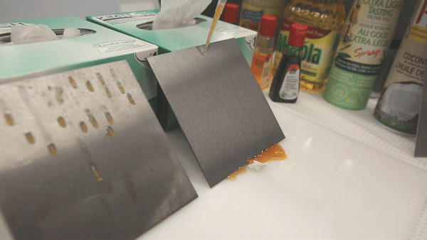 Food particles can accumulate on an untreated stainless steel surface, at left, increasing the risk of contamination in food production facilities. The oil-treated surface, at right, repels material. (Credit: Liz Do)
