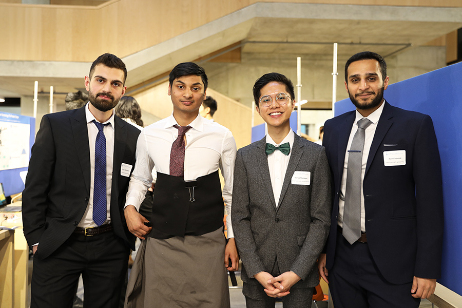 Ariel Seebarran (Year 4 MSE), second from left, wears the early prototype of his team’s redesigned lower-body space suit. (Photo Credit: Liz Do)