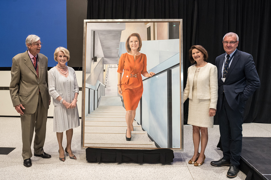 From left: Dean Emeritus Michael Charles, U of T Chancellor Rose Patten, Dean Cristina Amon and Professor Ron Venter unveil a portrait of Amon by artist Joanne Tod. The portrait will be displayed in the foyer of the Myhal Centre. (credit: Lisa Sakylensky)
