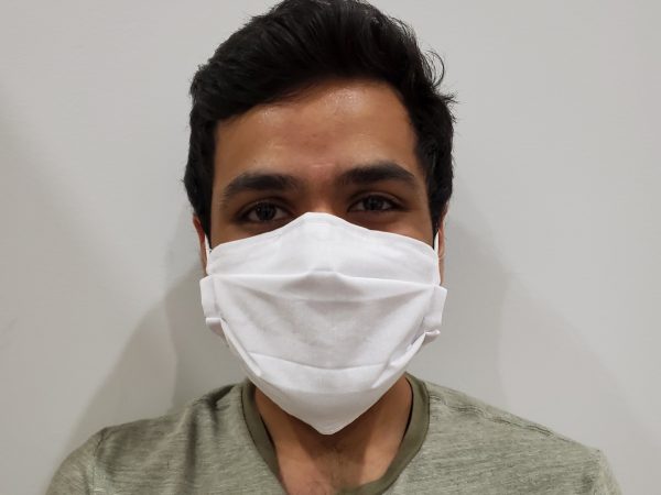 U of T Engineering graduate students Kramay Patel (pictured) and Chaim Katz are leading a volunteer effort to stitch homemade masks for the Toronto community. (Photo courtesy of Kramay Patel and Chaim Katz) 
