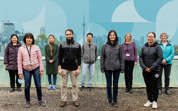 Members of U of T’s SARS-CoV-2 wastewater surveillance team stand together on the rooftop of the Wallberg Building. (Photo: Daria Perevezentsev)
