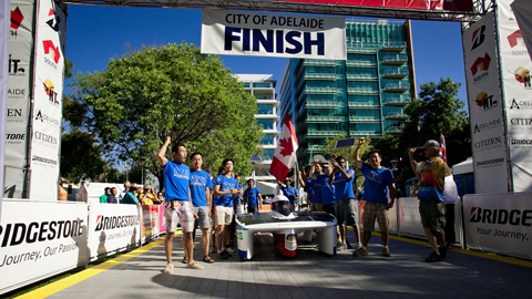 The Blue Sky Solar Racing team crosses the finish line