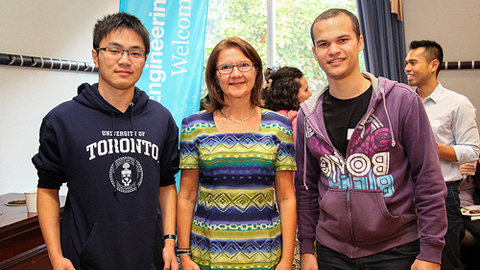 Dean Cristina Amon poses with students