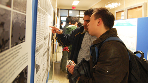 Students take the opportunity to learn more about energy research during the poster presentations portion