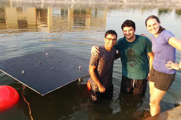 Graduate students Shakya Sur, Ahmed Mahmoud, and Professor Amy Bilton