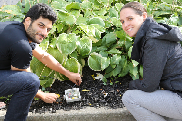 Mahmoud and Bilton demonstrate the soil moisture probe. In March, Spero Analytics began a pilot project involving 30 networked probes in Nepal. (Photo: Tyler Irving)