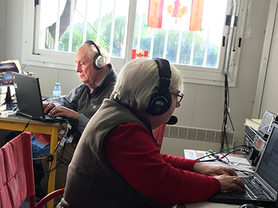 U of T Engineering alumnus Donald Studney, at left, operates the radio station from the shack at Vimy Ridge in April 2017. (Courtesy: Donald Studney).