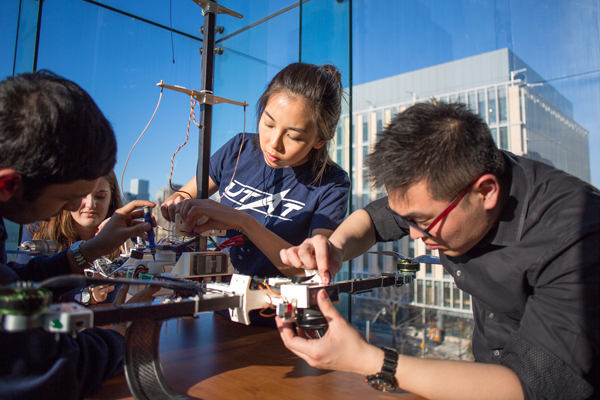 Members of the University of Toronto Aerospace Team (UTAT) work on a drone. UTAT is one of many student clubs and design teams that will have dedicated space in the Myhal Centre. (Photo: Roberta Baker)