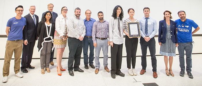 Team Voco alongside Demo Day judges, Dean Cristina Amon and Joseph Orozco.