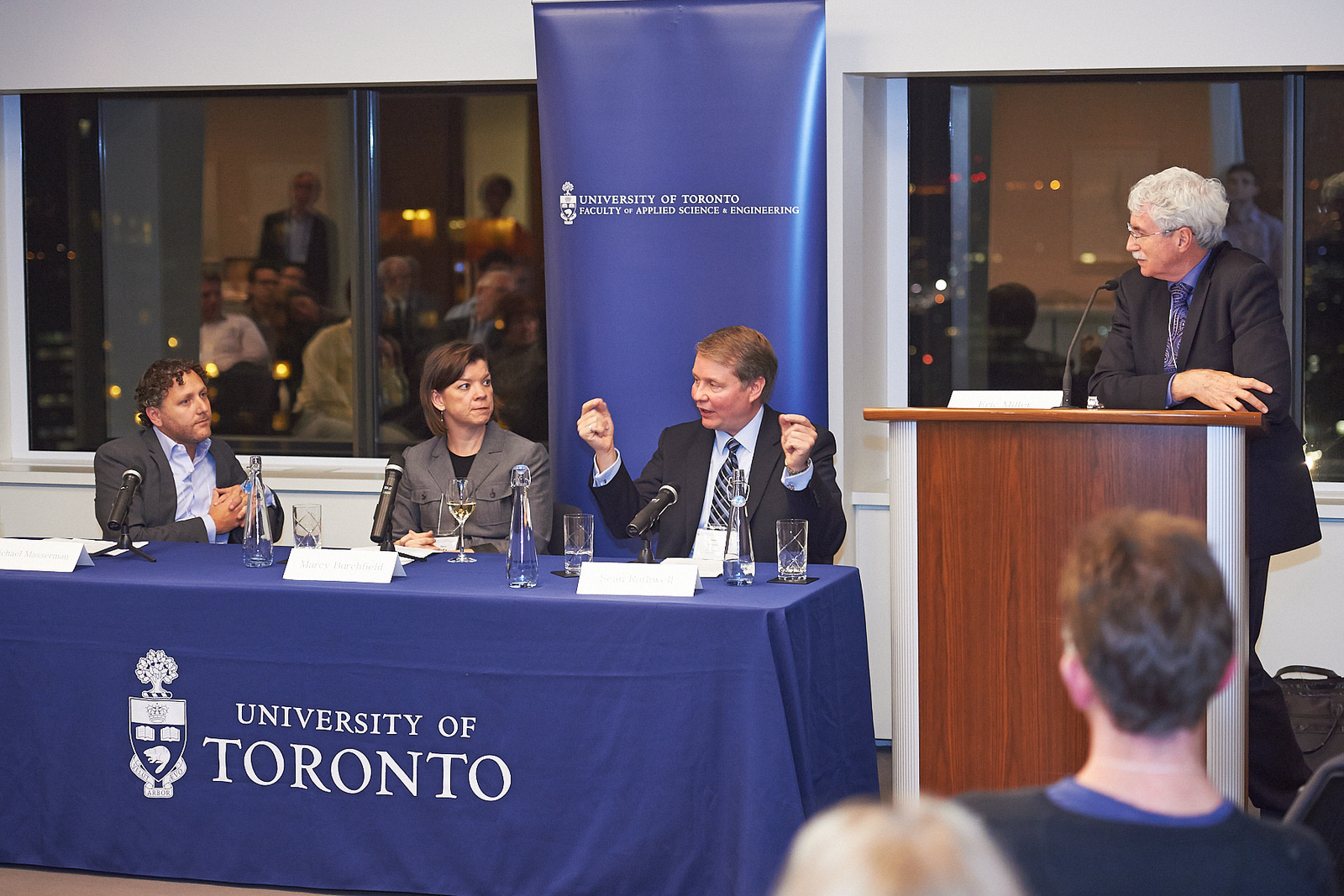 Panelists Michael Masserman, Marcy Burchfield and Sean Rathwell, and moderator Eric Miller (L-R), discuss urban transportation solutions at the latest BizSkule event (Photo: Brian Summers).