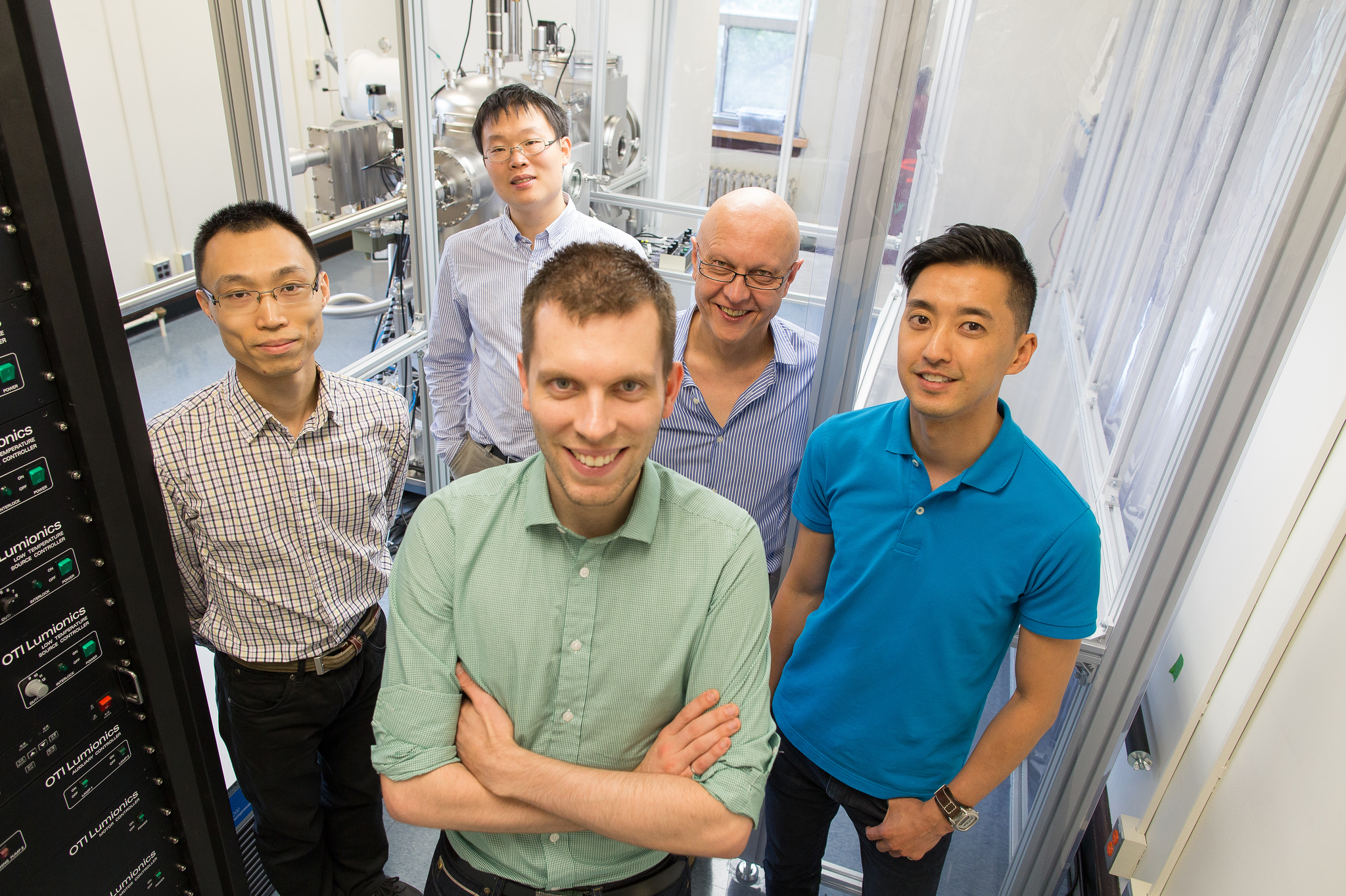 Alumnus Michael Helander’s (centre) startup—OTI Lumionics—received significant investment from the Canadian government to build a pilot production line capable of producing high-volumes of their organic LED lighting panels (Photo: Roberta Baker).