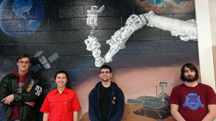 Team AVAIL — left to right, Caulan Rupke (Year 4 EngSci), Neell Young (EngSci 1T4 + PEY, UTIAS MASc candidate), Andrew Ilersich and Michael Lawee (both Year 4 EngSci) — has designed a physics experiment that will be carried out in simulated microgravity. Their results could accelerate the use of 3D printers to address key challenges for long-term space missions. (Photo credit: Team AVAIL)