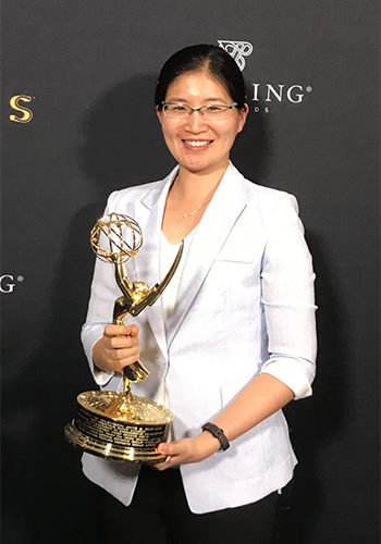 Vivienne Sze (ElecE 0T4) holds the Emmy her team won at the 69th Engineering Emmy Awards. The U of T Engineering alumna is now a professor at the Massachusetts Institute of Technology. (Photo: Minhua Zhou).