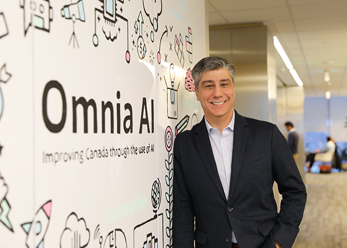 Alex Grbic (CompE 9T4, MASc 9T6, PhD 0T3) has returned to Toronto to solve big industry problems by developing AI software solutions. (Photo credit: Liz Do)