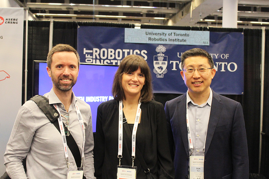 The Robotics Institute will be led by Professor Yu Sun (MIE), far right, and will include faculty members Tim Barfoot (UTIAS), who will lead the autonomous field robotics pillar, and Professor Angela Schoellig (UTIAS). (Photo courtesy of the Robotics Institute)