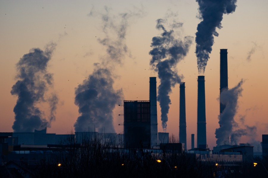 Emissions are seen rising from an industrial facility. Professor Greg Evans (ChemE) studies connections between air pollution and human health. (Photo: Ella Ivanescu / Unsplash)  