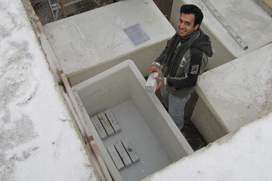 In this photo from 2010, then-graduate student Reza Ahani (CivMin PhD 1T9) prepares concrete samples made with various formulations for testing. (Photo Doug Hooton)