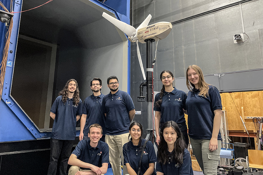 The UTWind team, seen here next to their winning prototype turbine at the Open Jet Facility wind tunnel at Delft University of Technology, placed first overall in the International Small Wind Turbine Contest (ISWTC). (Photo: Niels Adema, Hanze University of Applied Sciences) 