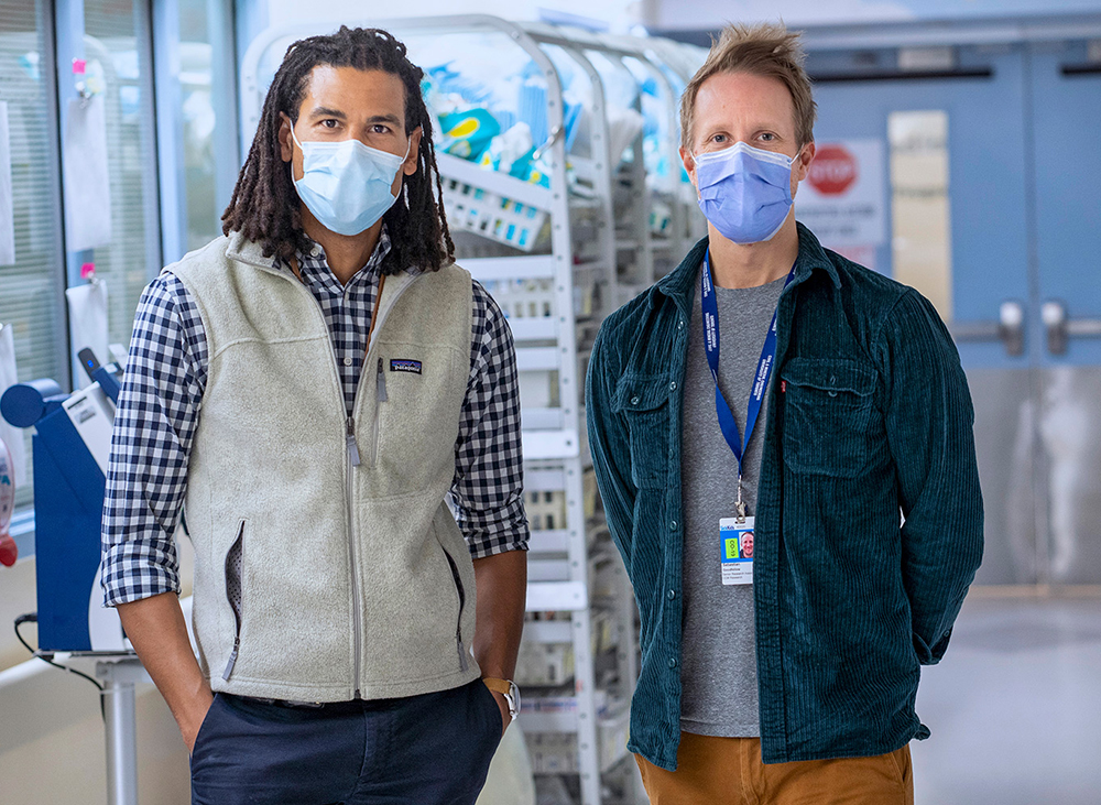 Dr. Mjaye Mazwi (left) and Professor Sebastian Goodfellow (CivMin) are training AI to recognize the warning signs of impending arrhythmia based on clinicians’ expertise and more than 10,000 electrocardiogram readings. (Photo: SickKids)