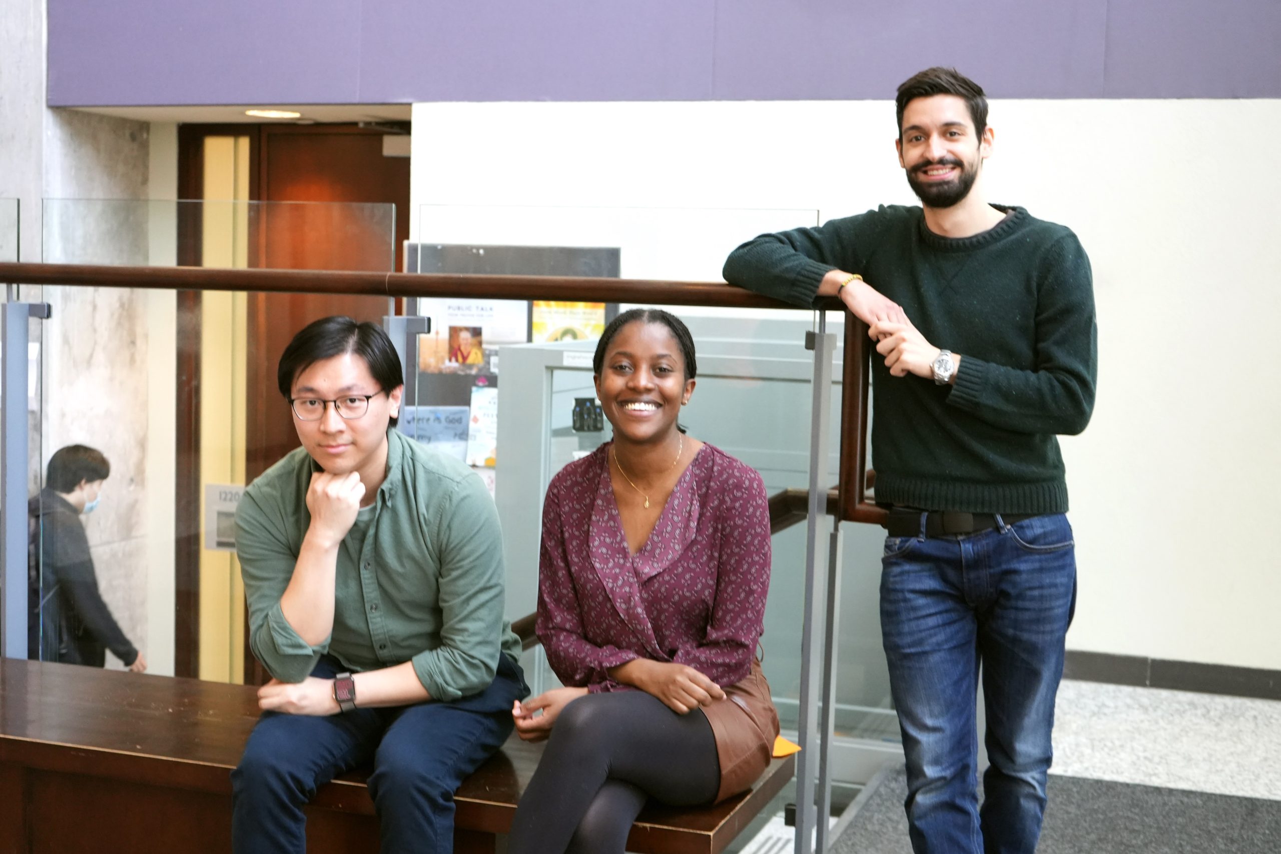 ECE grad students (from left to right) Jingyang Liu, Iris Uwizeyimana and Michail Bachras reflect on the new graduate course ECE1718 after their final project presentations. The course, taught by Professor Natalie Enright Jerger (ECE), gives students an overview of the societal impact of computer hardware and systems, exploring issues such as climate change, inequality and bias, healthcare, security and privacy. (Photo: Matthew Tierney)