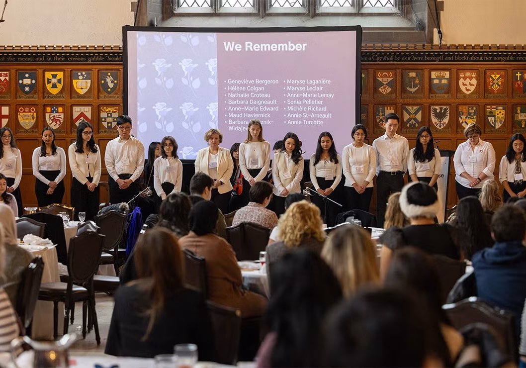 Students read the names of the 14 women killed during the 1989 École Polytechnique massacre, during a December 6 event held at Hart House. (photo by Johnny Guatto)