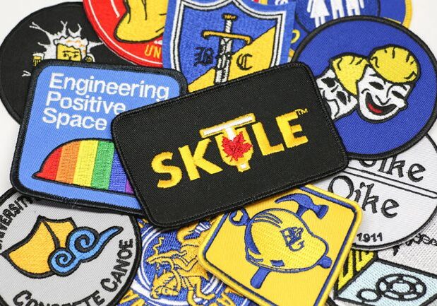 Badges relating to the activities for the U of T Engineering Society and its affiliated clubs. A new bursary from Skule™ Mental Wellness will expand access to mental health and wellness supports for students. (Photo: Roberta Baker)