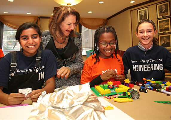 Dean Cristina Amon works with elementary school students as they design their vision for the neighbourhood of the future at a U of T Engineering outreach event Oct. 17, 2017. Increasing diversity in its programs and the profession is a central goal of the Faculty’s new Academic Plan, which the U of T community is invited to provide feedback on by Nov. 17. (Credit: Roberta Baker).
