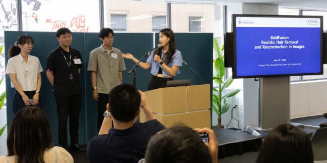Graduate students present their research project
