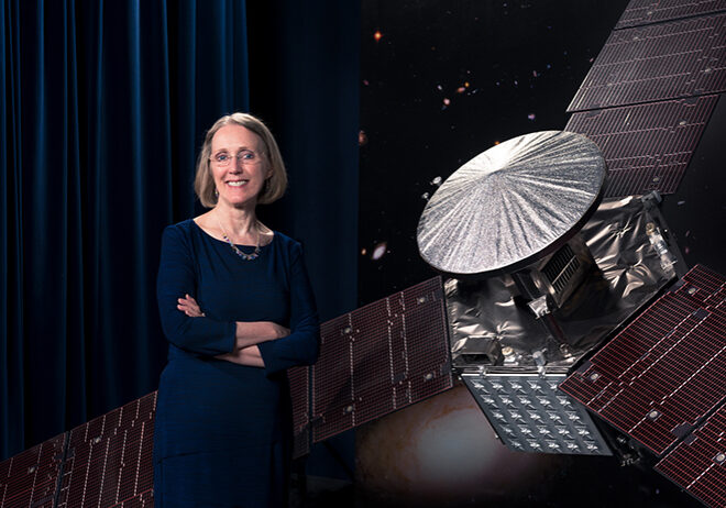 Cutline: Janis Chodas, the director for engineering and science at NASA's Jet Propulsion Laboratories, stands beside a one-third scale model of the Juno spacecraft (photo courtesy of JPL).