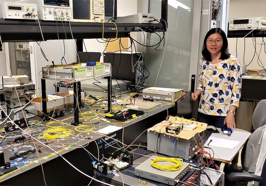 Professor Li Qian (ECE), shown in her lab pre-pandemic, is part of a research team that proposed a new quantum fingerprinting protocol, which is used to quickly and securely identify whether information from two sources is the same. (Photo: Don Figer)