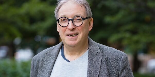 profile photo of Santerre with trees in the background