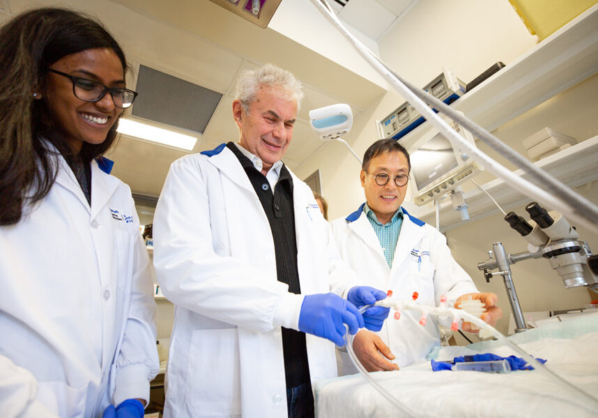 Arthur Slutsky in his lab with graduate student Thenuka Thanabalasingam (left) and researcher Dr. Haibo Zhang (right). Slutsky recently stepped down after 18 years as Research at St. Michael’s Hospital. (Photo: Roberta Baker)