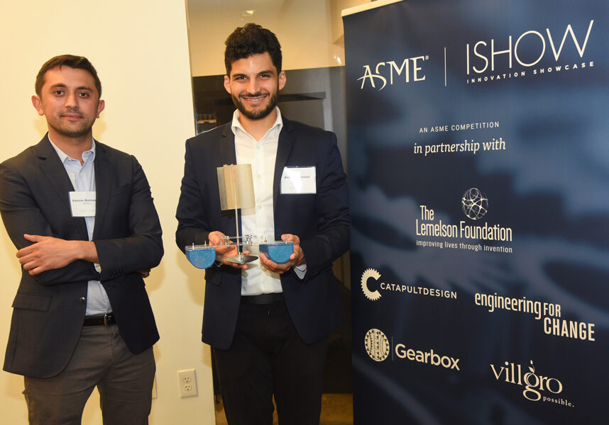Left to right: Kamran Mahmoudov and Ahmed Mahmoud demonstrate a prototype of the WERLWind, a passive aerator that leverages wind power to deliver oxygen for fish farms. The invention won first place the 2019 Innovation Showcase, hosted by the American Society of Mechanical Engineering. (Photo: Cecil Brathwaite)